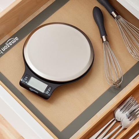Amazon Basics Digital kitchen scales with LCD display (with batteries), Black and Stainless Steel, BPA free, Weighs up to 11 pounds